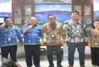 Pihak KPPU Kanwil I Sumbagut berfoto bersama dengan pihak BPS Sumut.